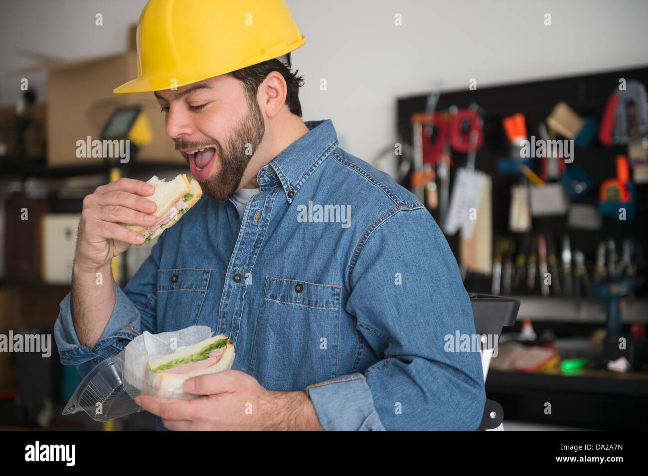 Portrait of manual worker taking break Stock Photo
