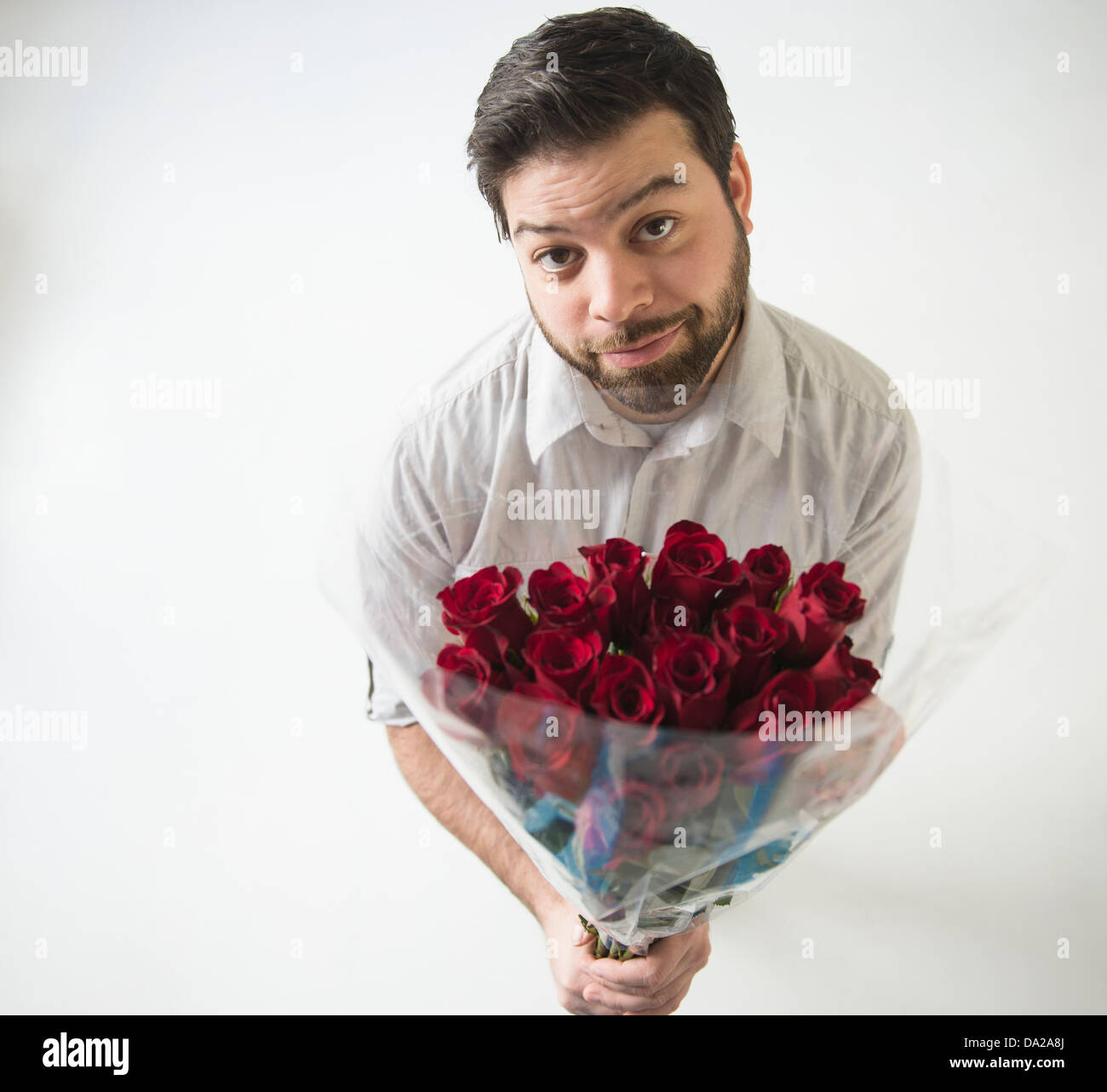 Portrait of man with bouquet Stock Photo - Alamy