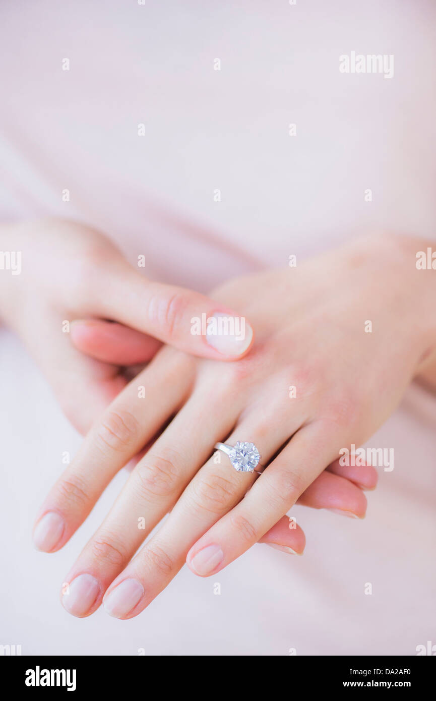 Woman hands with engagement ring Stock Photo