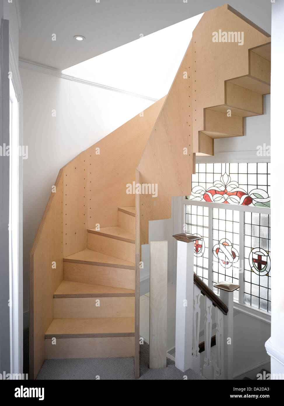 Farrer House, London, United Kingdom. Architect: West Architecture, 2013. Plywood staircase. Stock Photo