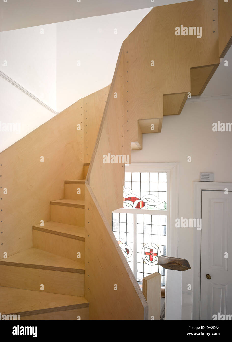 Farrer House, London, United Kingdom. Architect: West Architecture, 2013. Plywood staircase. Stock Photo