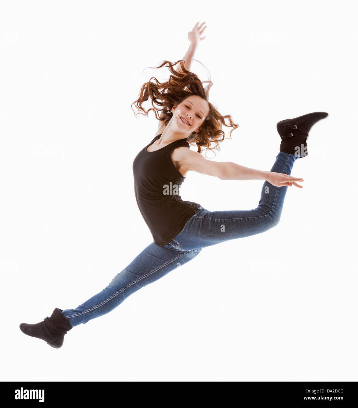 Portrait of jumping girl (12-13) Stock Photo