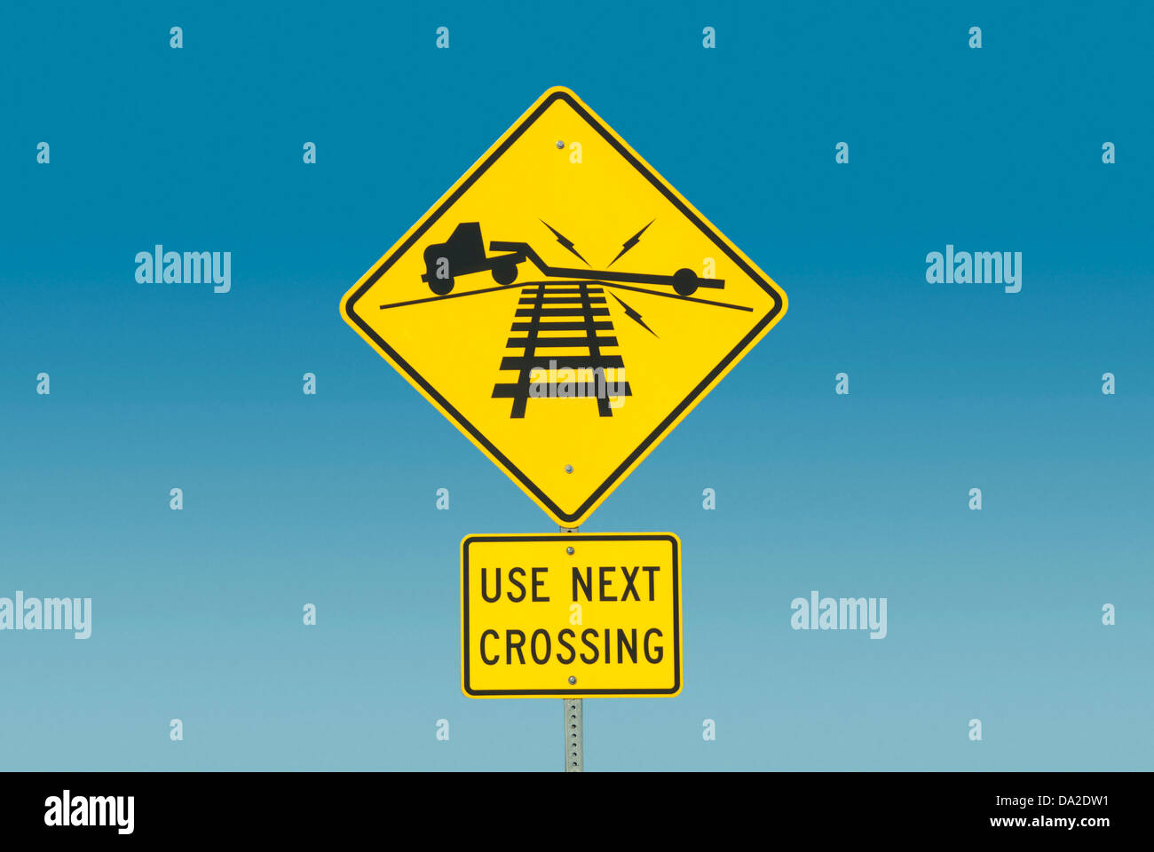 Yellow truck crossing sign hi-res stock photography and images - Alamy
