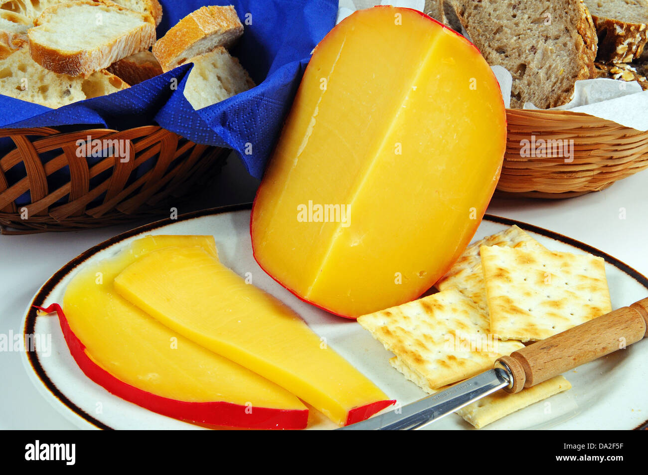 Edam cheese with bread and crackers Stock Photo Alamy