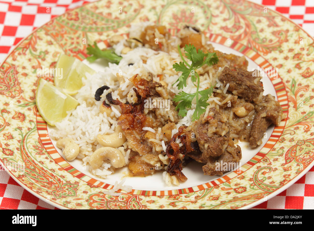 A dinner plate of homemade biryanitype fragrant lamb curry, cooked