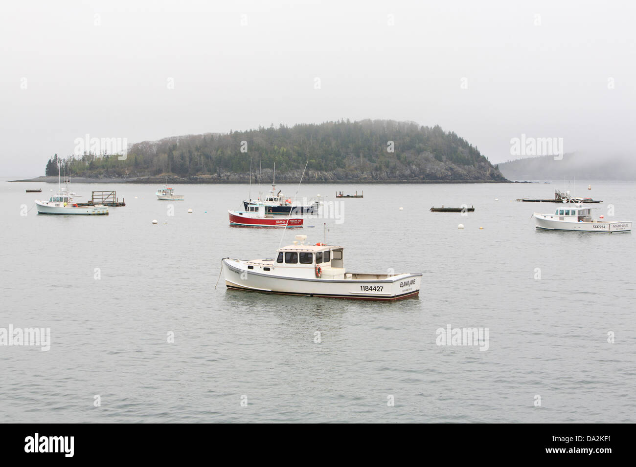 Fishing boats at anchor in foggy weather, Bar Harbor, Maine. Stock Photo