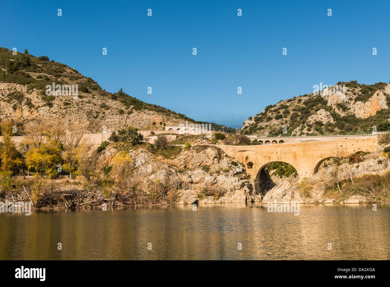 Pont du Diable on the Herault River, constructed in the 11th century, Languedoc Roussillon, France Stock Photo