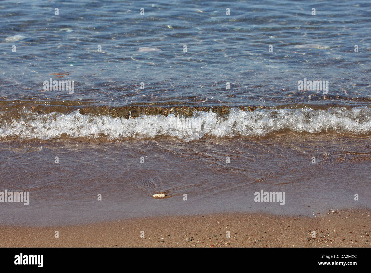 this is a small wave on the coast of Adriatic sea Stock Photo - Alamy