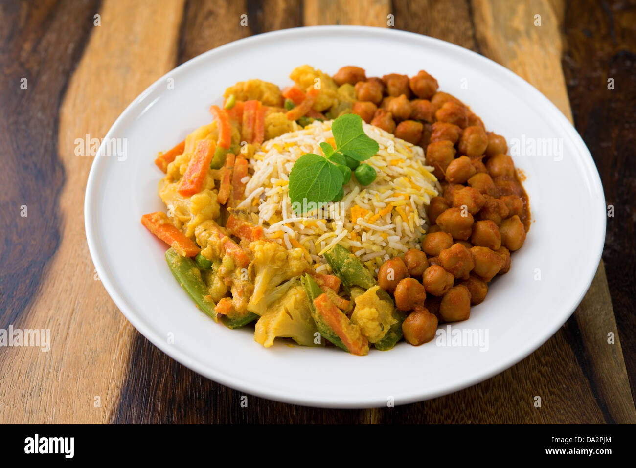 Vegetarian biryani rice or pilau rice with curry, fresh cooked basmati