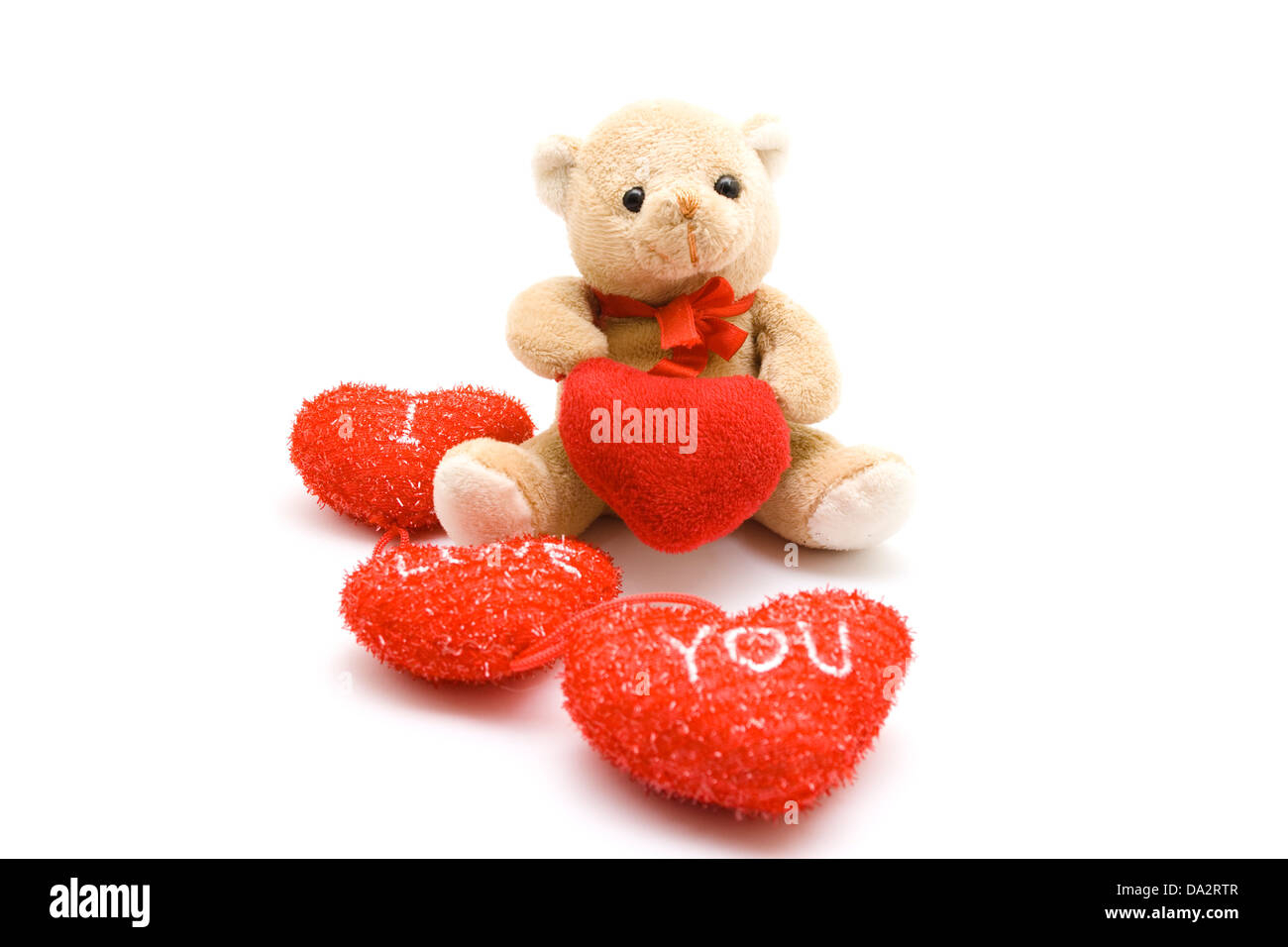Red hearts with Teddy bear on white background Stock Photo - Alamy