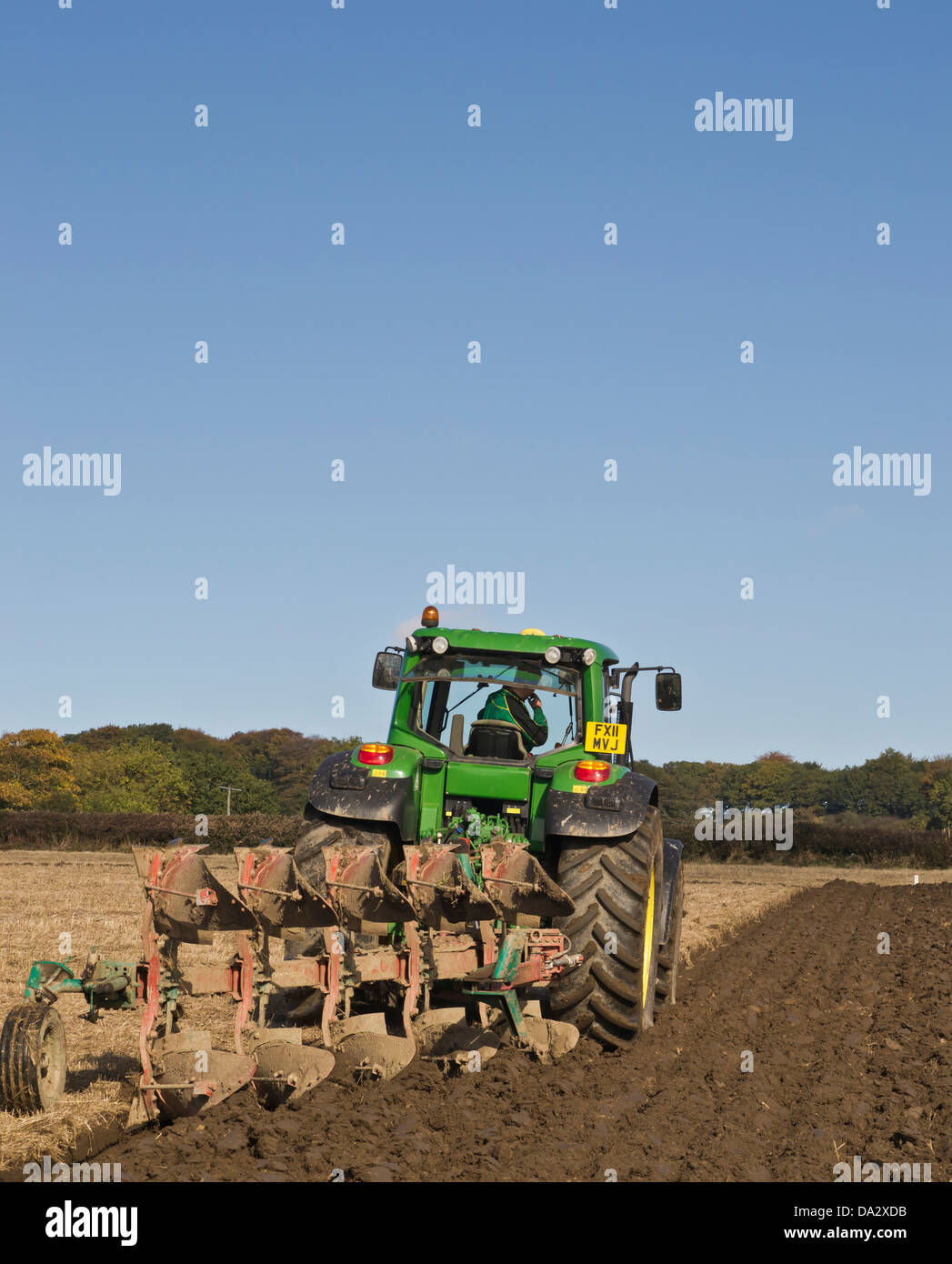 john deere tractor ploughing / ploughed field Stock Photo Alamy