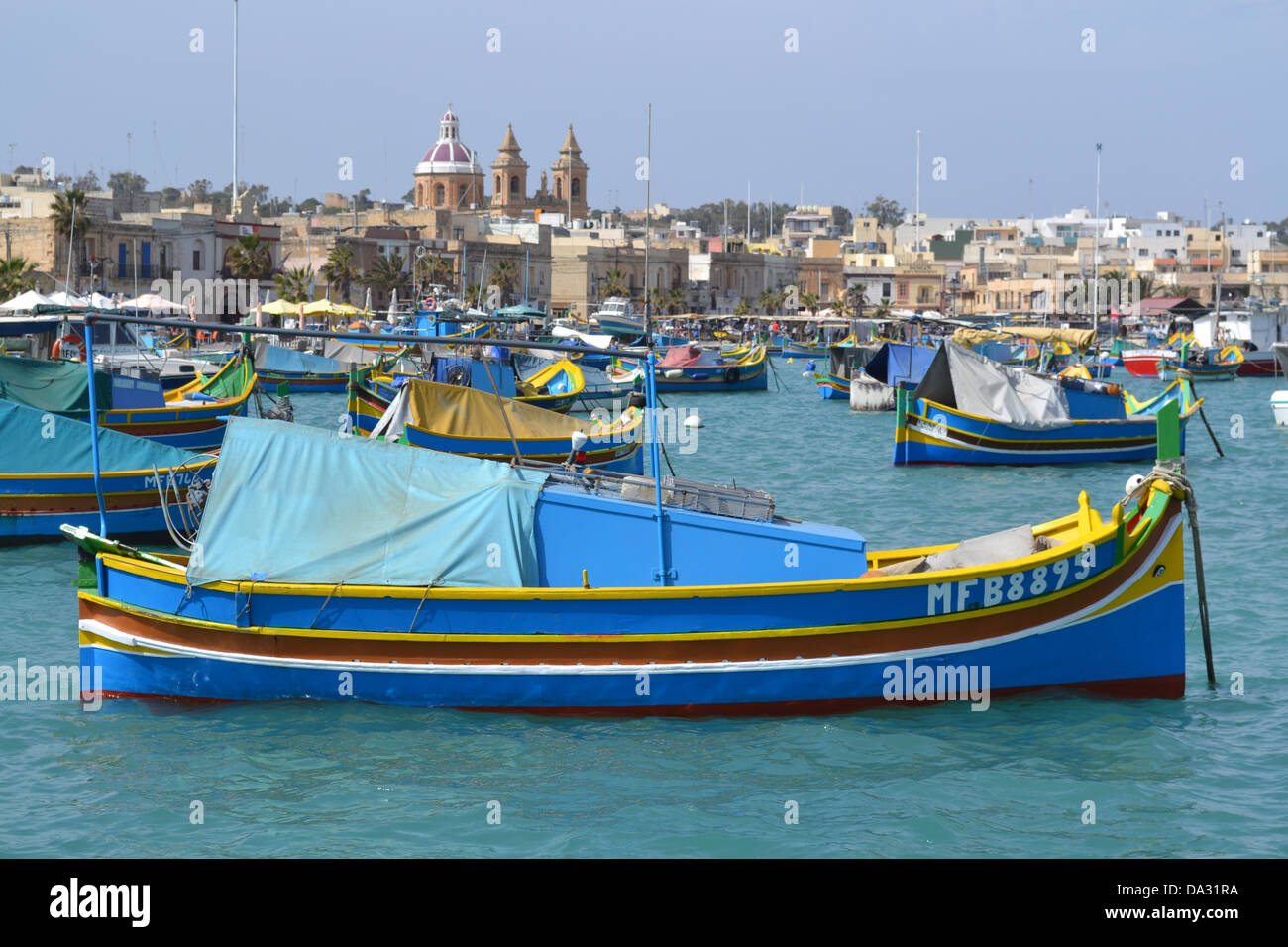 Colourful fishing boats, Marsaxlokk fishing village, Malta Stock Photo