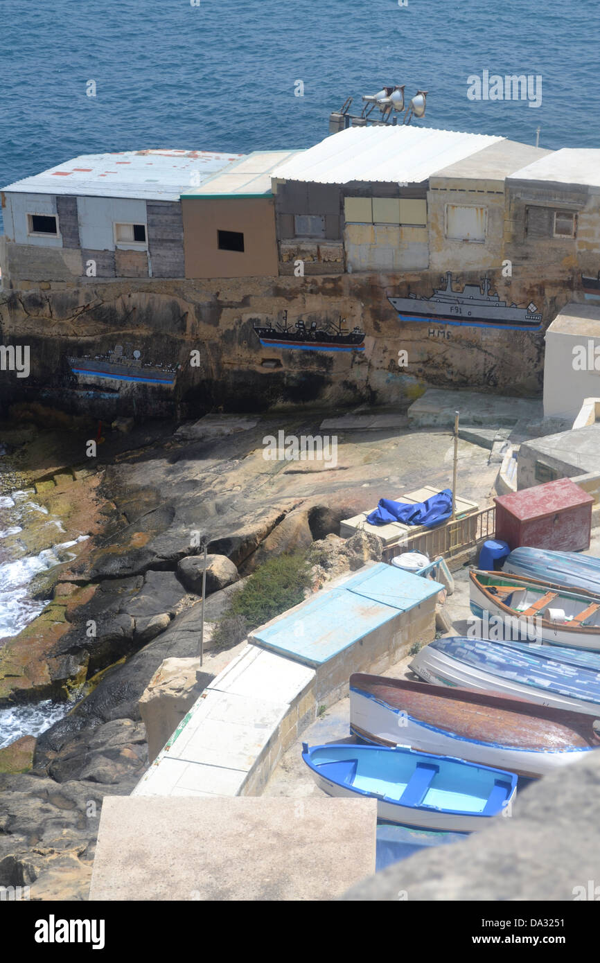 Shanty town style houses and graffiti, Valletta town, Malta. Stock Photo