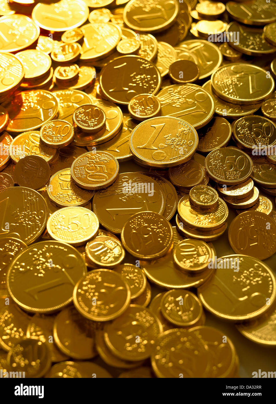 Golden 1 Euro coins Stock Photo