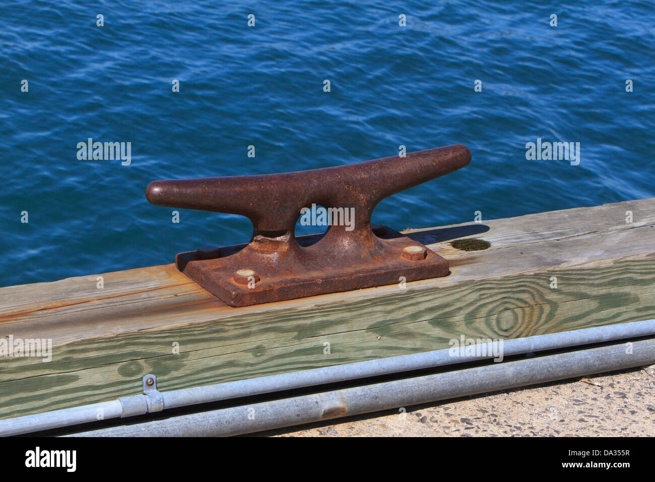 Cleat for tying a boat to the dock Stock Photo Alamy