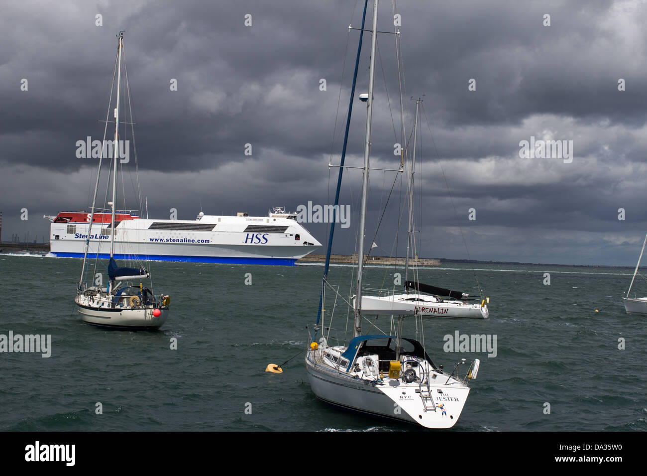 A ferry docking in Dún Laoghaire harbor. Stock Photo