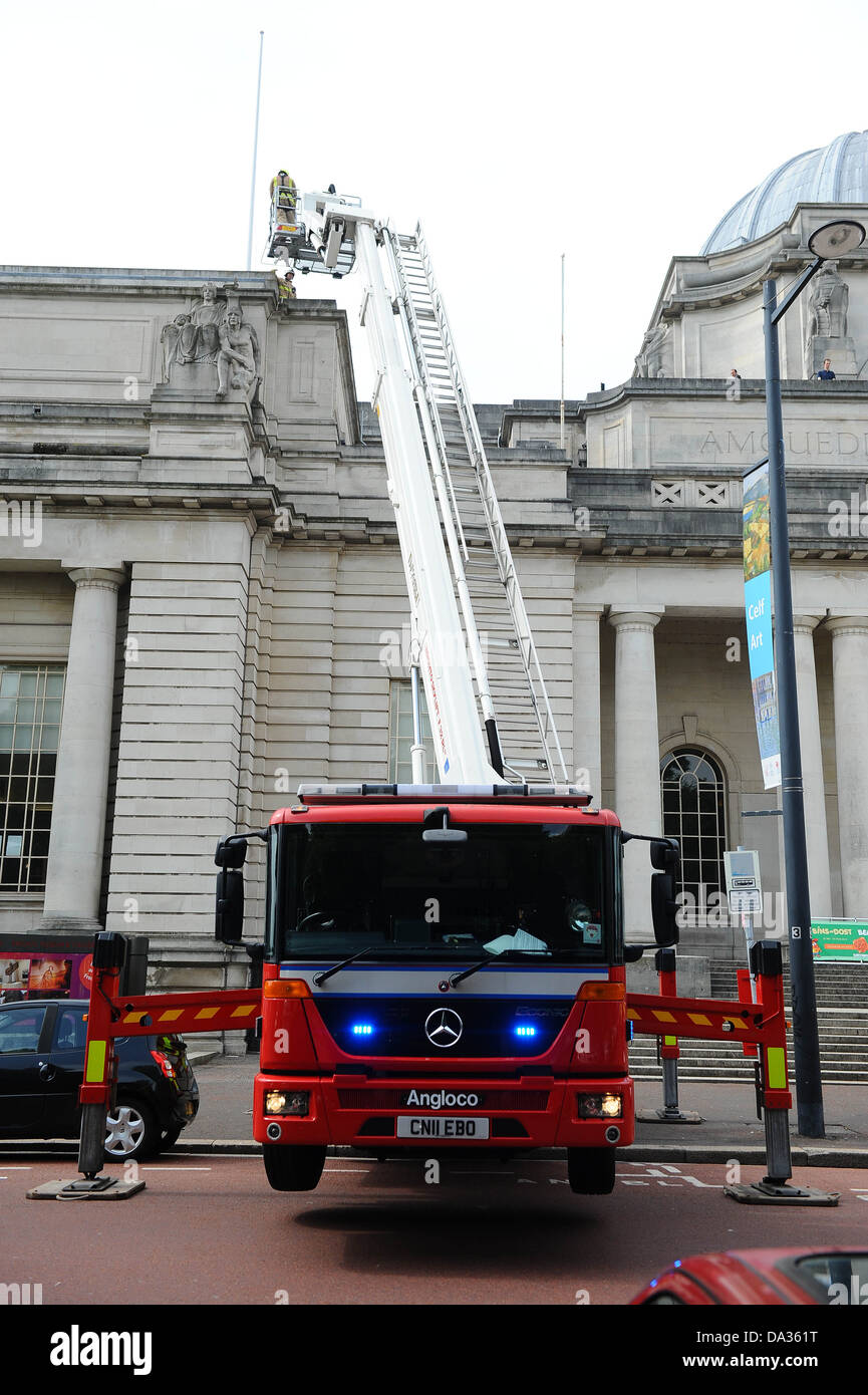 Fire sevice rescue using fire engine / hydraulic platform and turntable ladder on National Museum roof in Cardiff Stock Photo