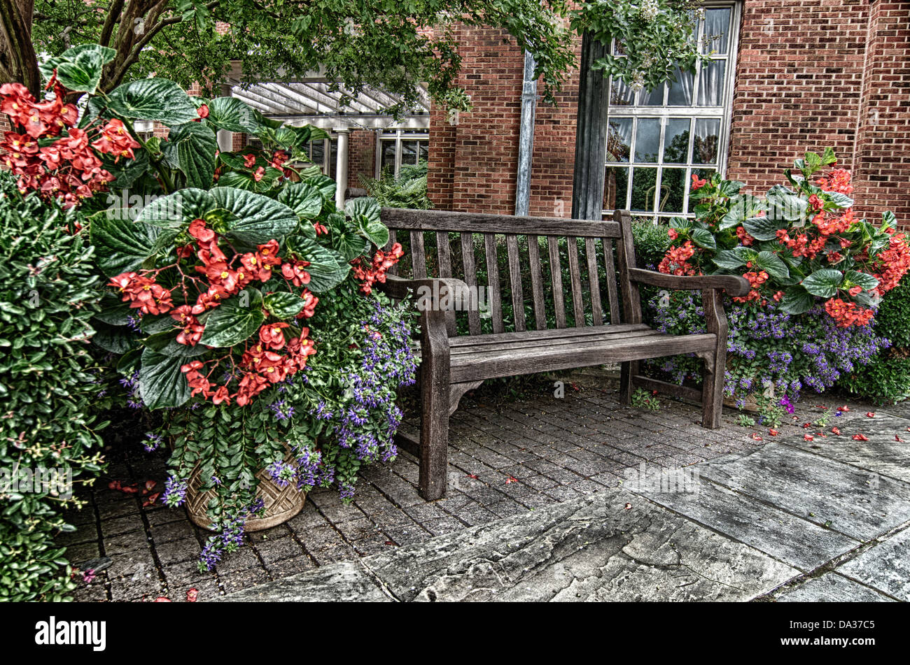 This image is a wooden bench on a terrace at the Alabama Shakespeare Festival in Montgomery, Alabama. Stock Photo