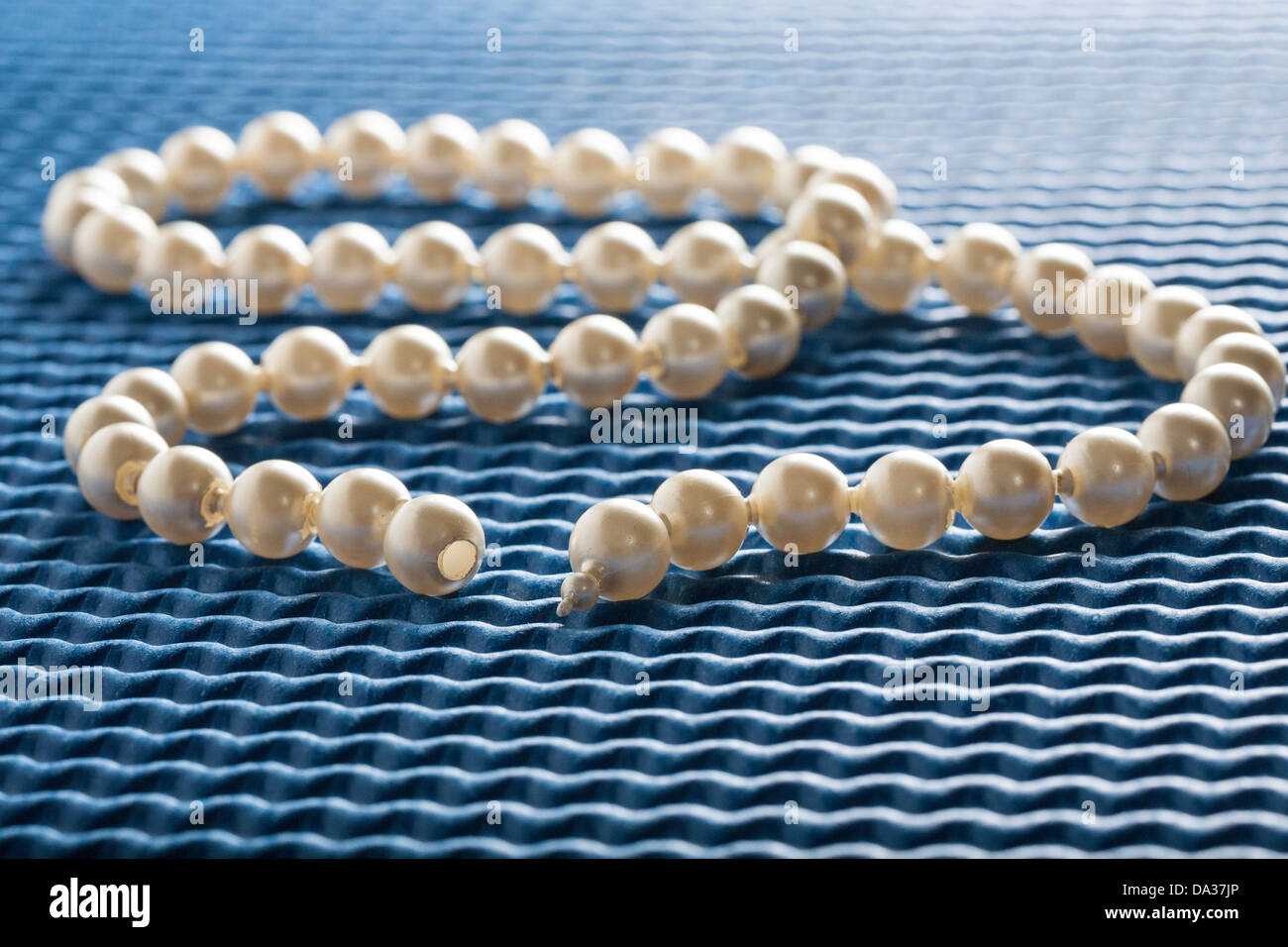Vintage Pop Beads on Blue Background Stock Photo