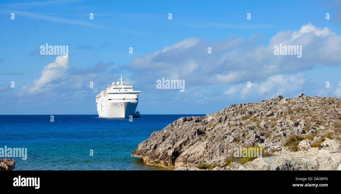 cruise ship and tender off the bahamas Stock Photo