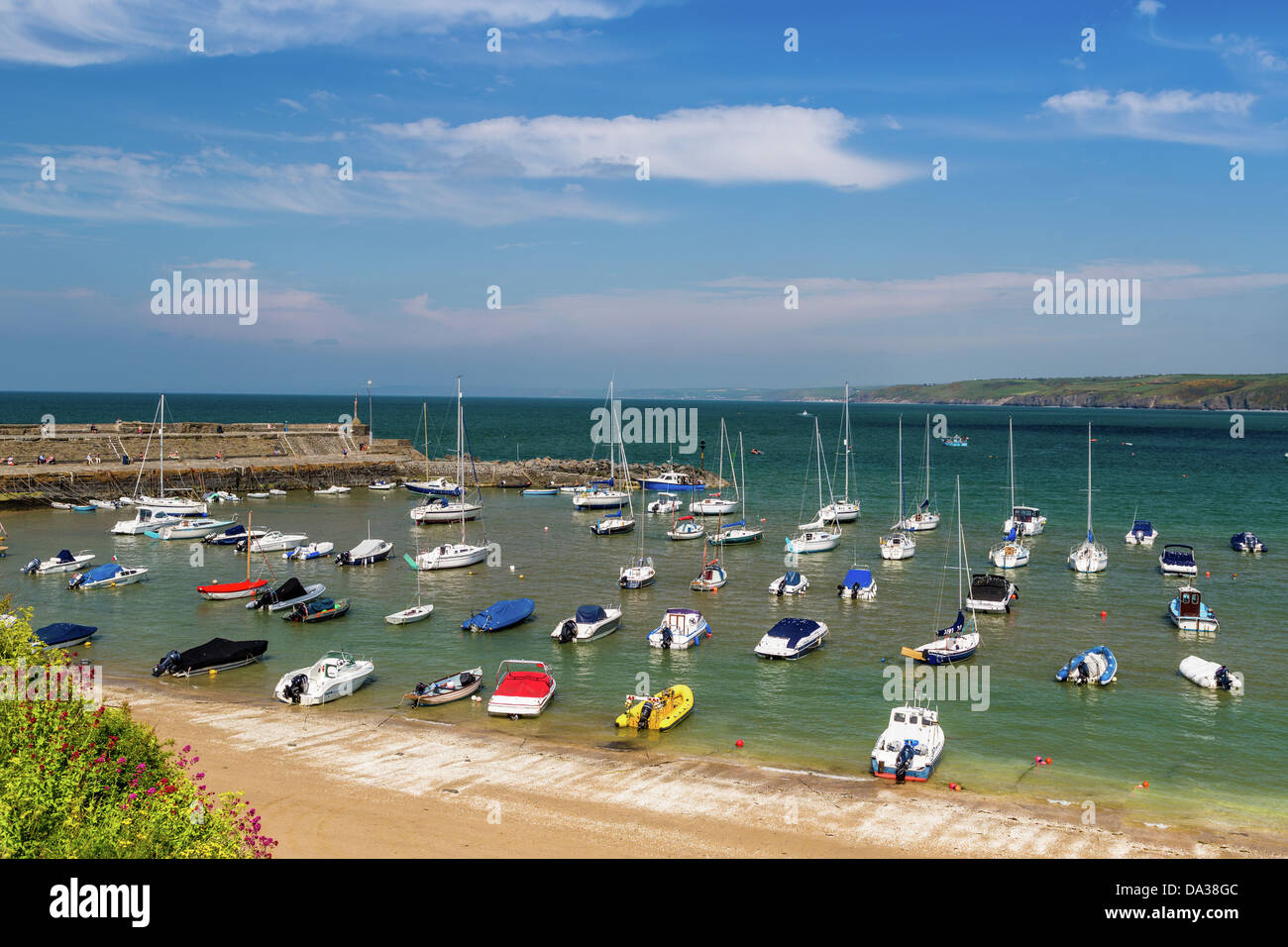 The Harbour at New Quay, Cardigan Bay Wales with yachts floating Stock
