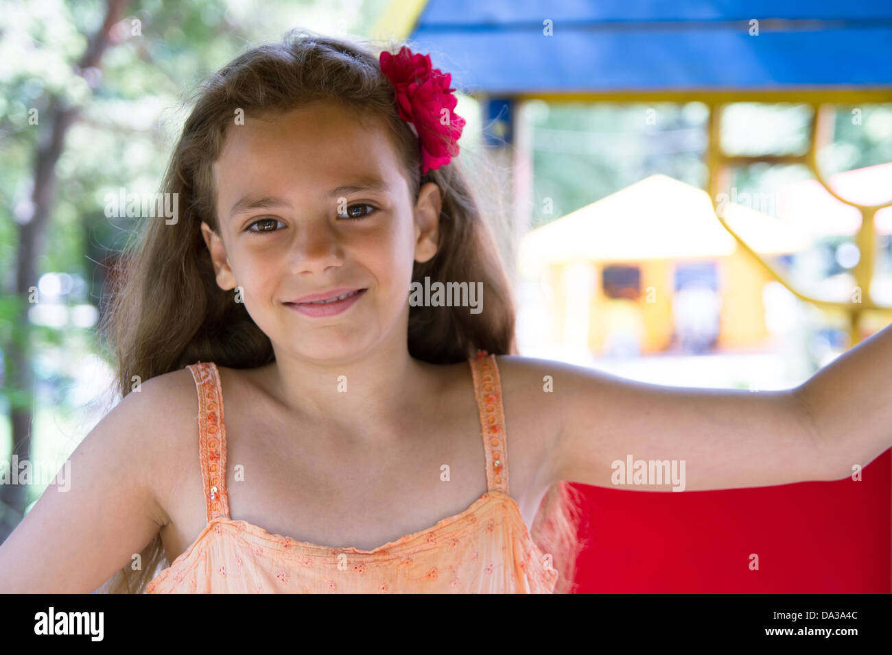 Cute little schoolgirl on the playground at summer day Stock Photo - Alamy
