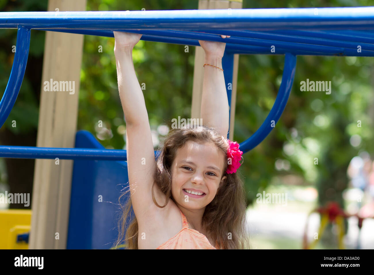 Cute little schoolgirl on the playground at summer day Stock Photo - Alamy