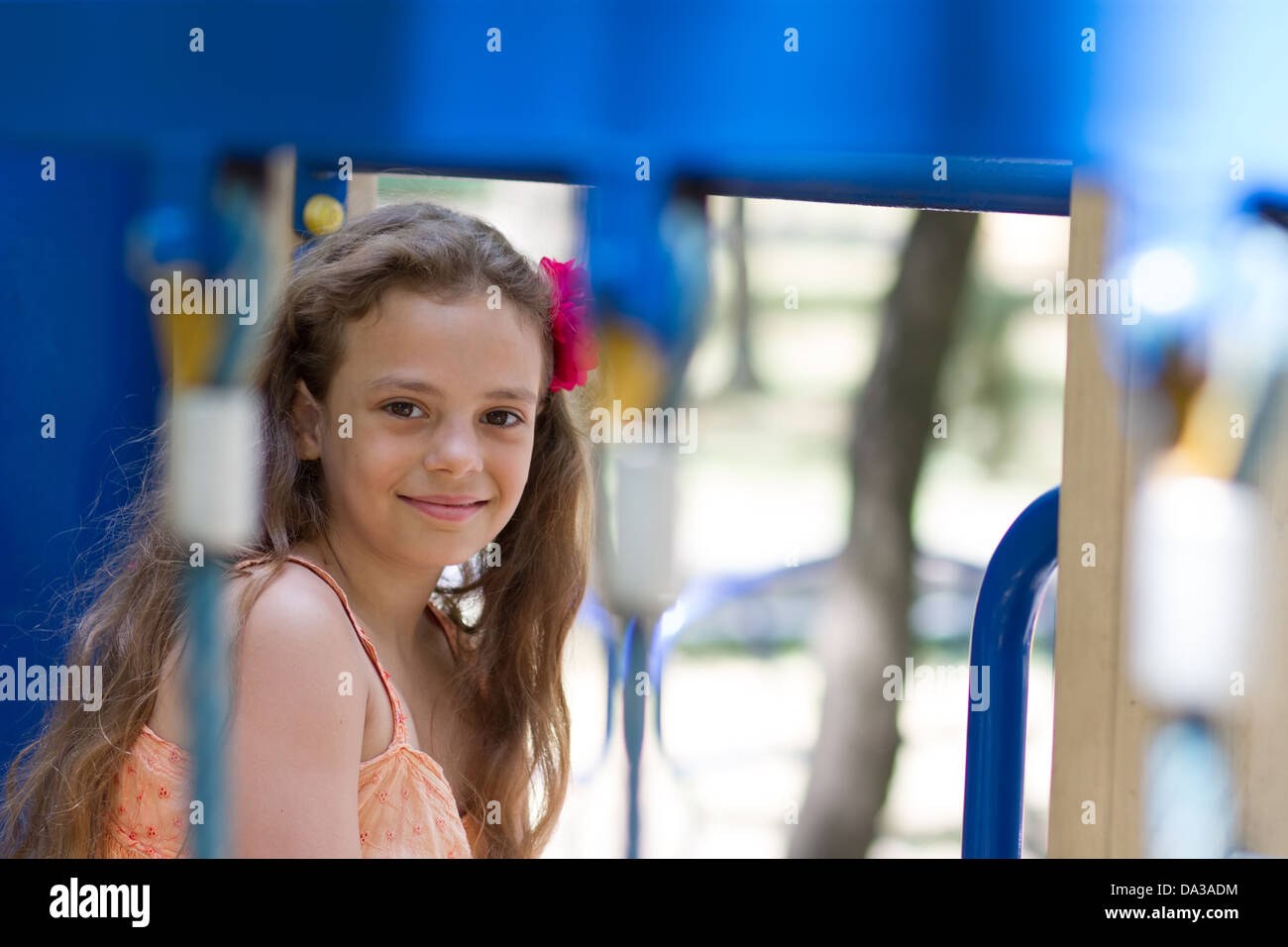 Cute little schoolgirl on the playground at summer day Stock Photo - Alamy
