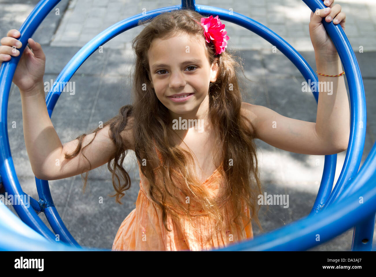 Cute little schoolgirl on the playground at summer day Stock Photo - Alamy