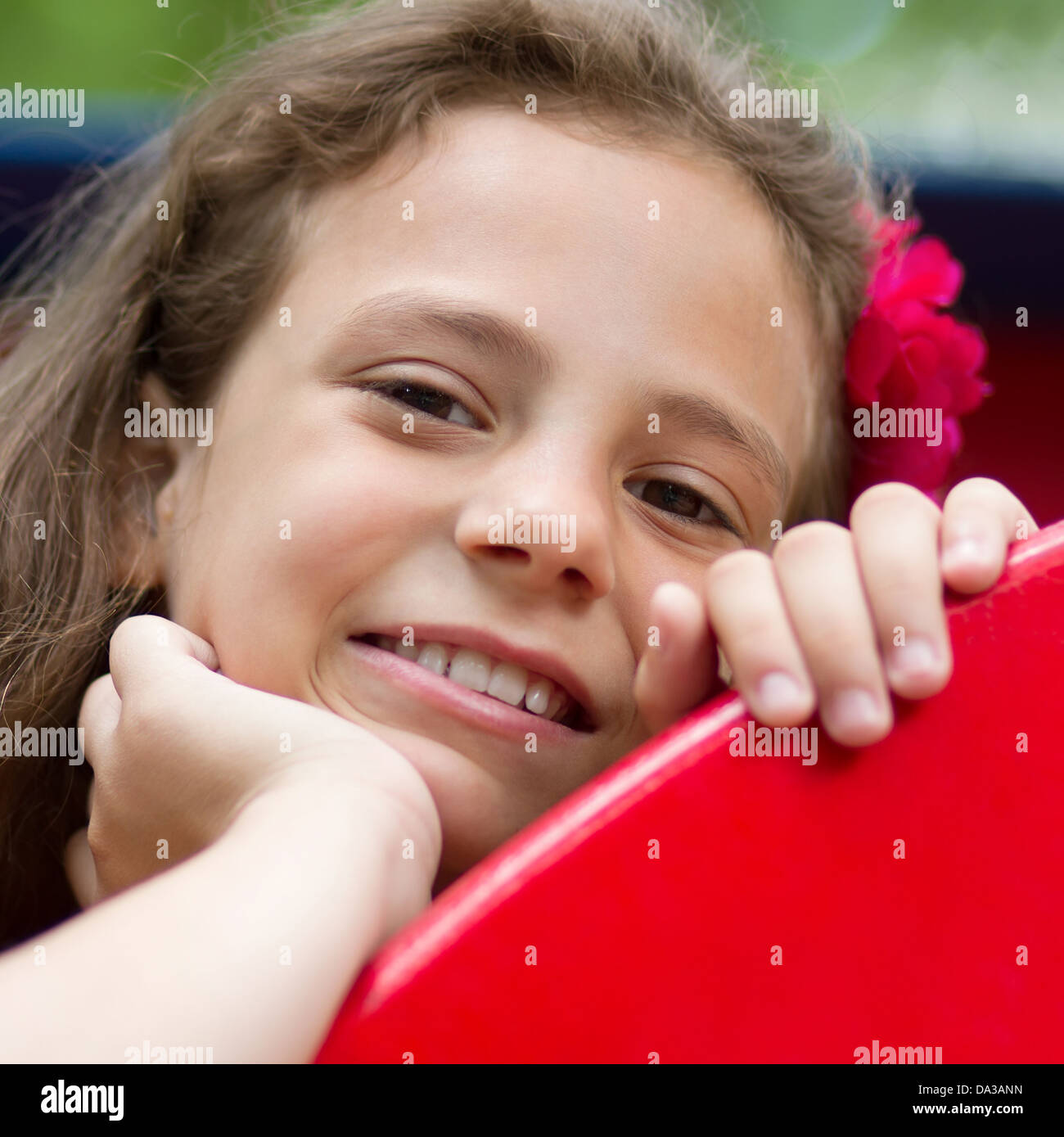 Cute little schoolgirl on the playground at summer day Stock Photo - Alamy