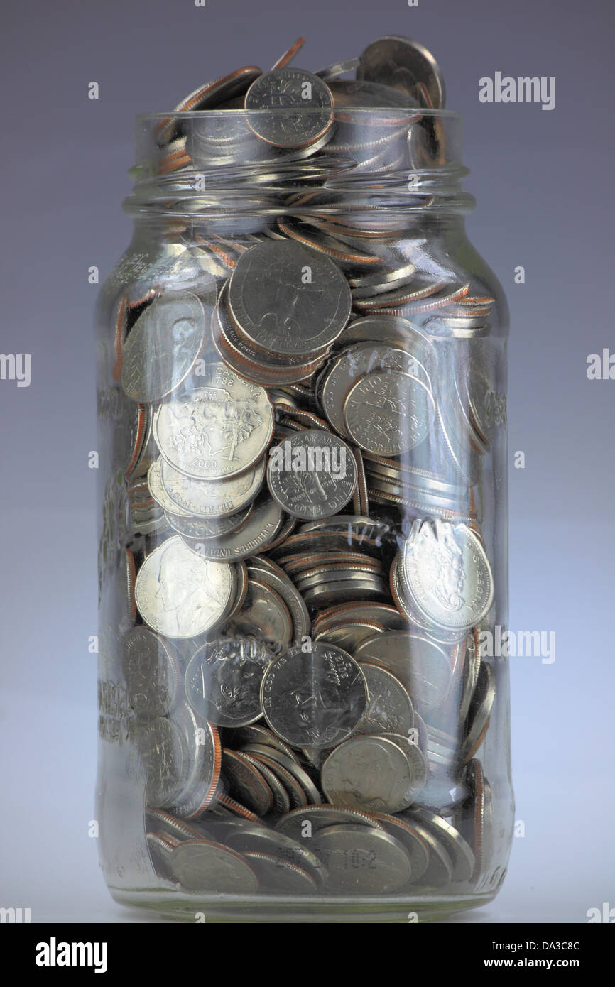 Jar of Silver Coins Stock Photo Alamy