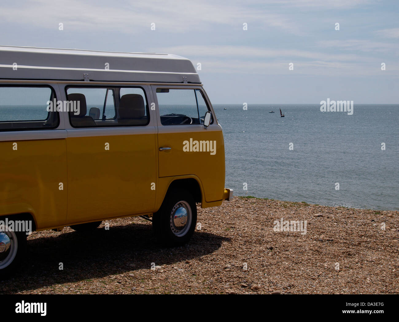 VW camper parked at the beach, Seaton, Devon, UK 2013 Stock Photo