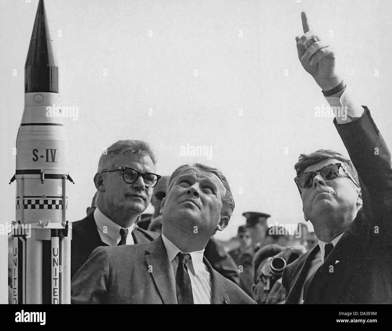 President John F. Kennedy Cape Canaveral Saturn V launch with Dr. Wernher von Braun, center 1963 Stock Photo