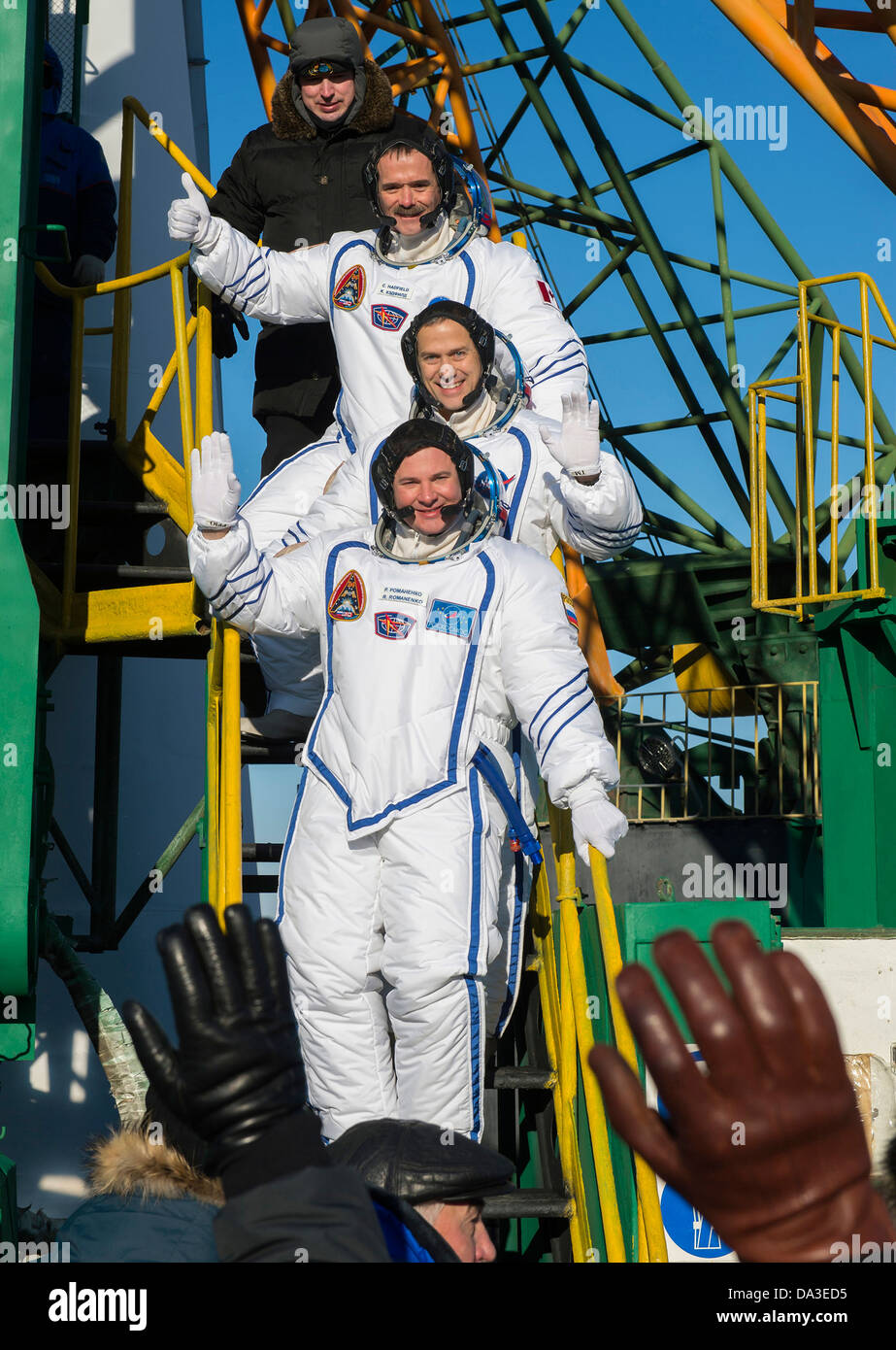 Space NASA Expedition 34 crew wave farewell Soyuz rocket Baikonur Cosmodrome Baikonur, Kazakhstan Stock Photo