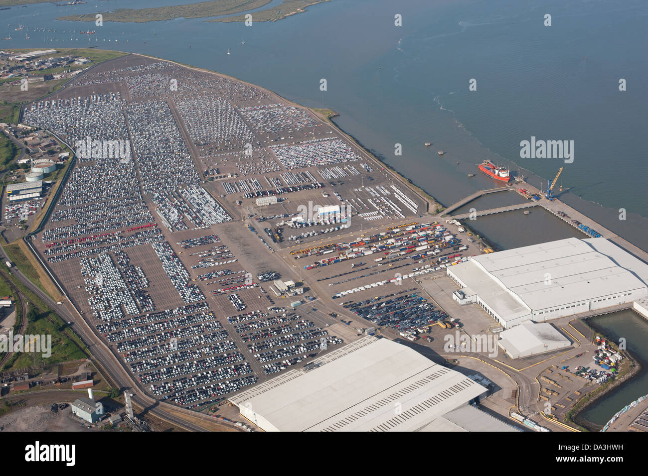 AERIAL VIEW. Vast car depository. Thames Estuary, Sheerness, Isle of Sheppey, Kent, England, Great Britain, United Kingdom. Stock Photo