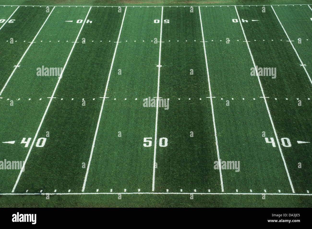 50 yard line on American Football field. Stock Photo