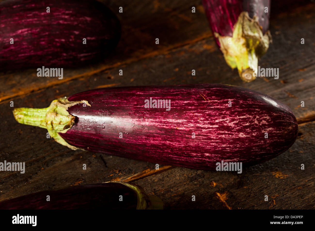 Ripe Organic Purple Eggplant on a Background Stock Photo