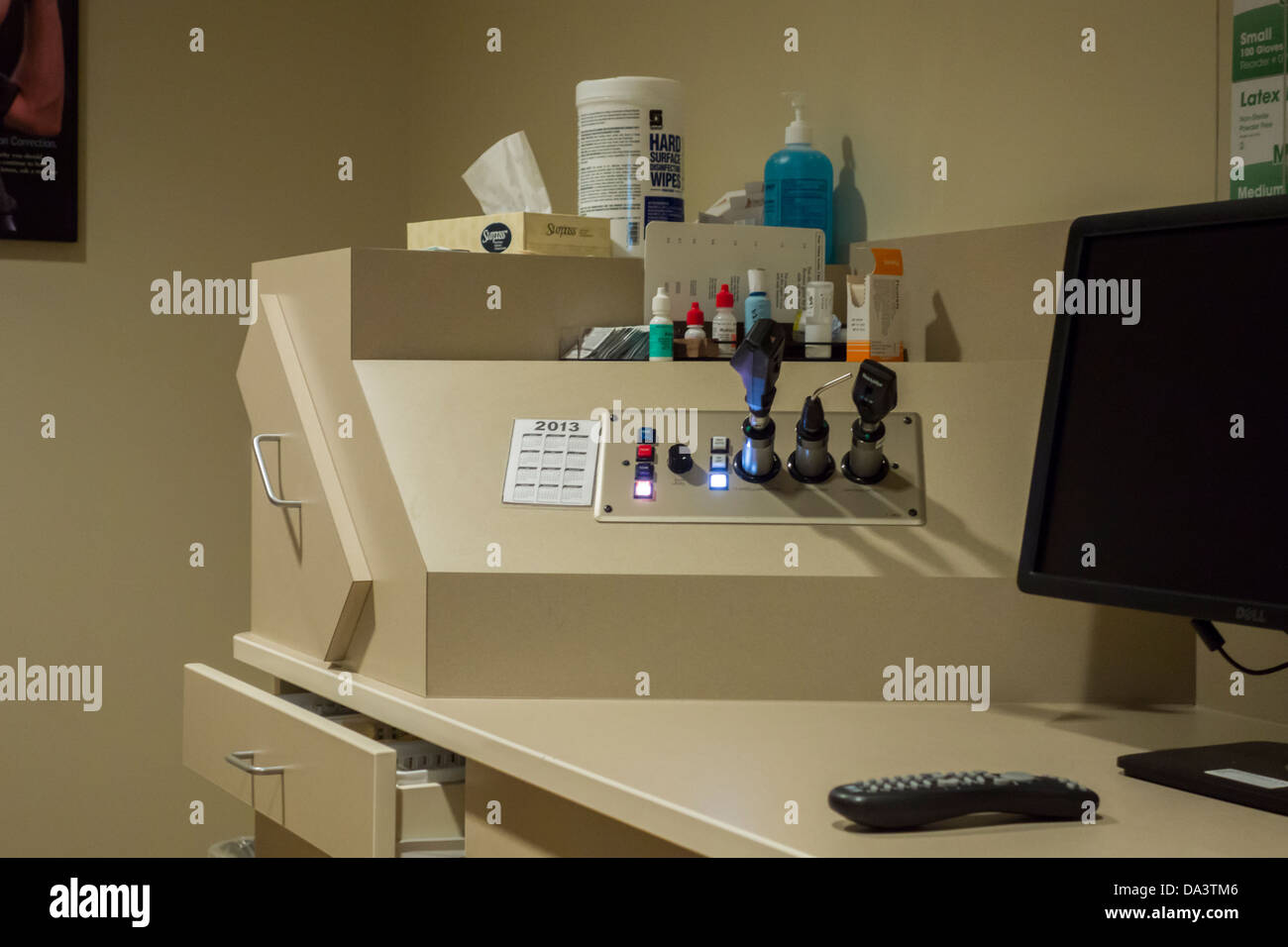 A counter in an Opthalmologist exam room, with ocular equipment and eye drops sitting on the counter. Oklahoma City, Oklahoma, USA. Stock Photo