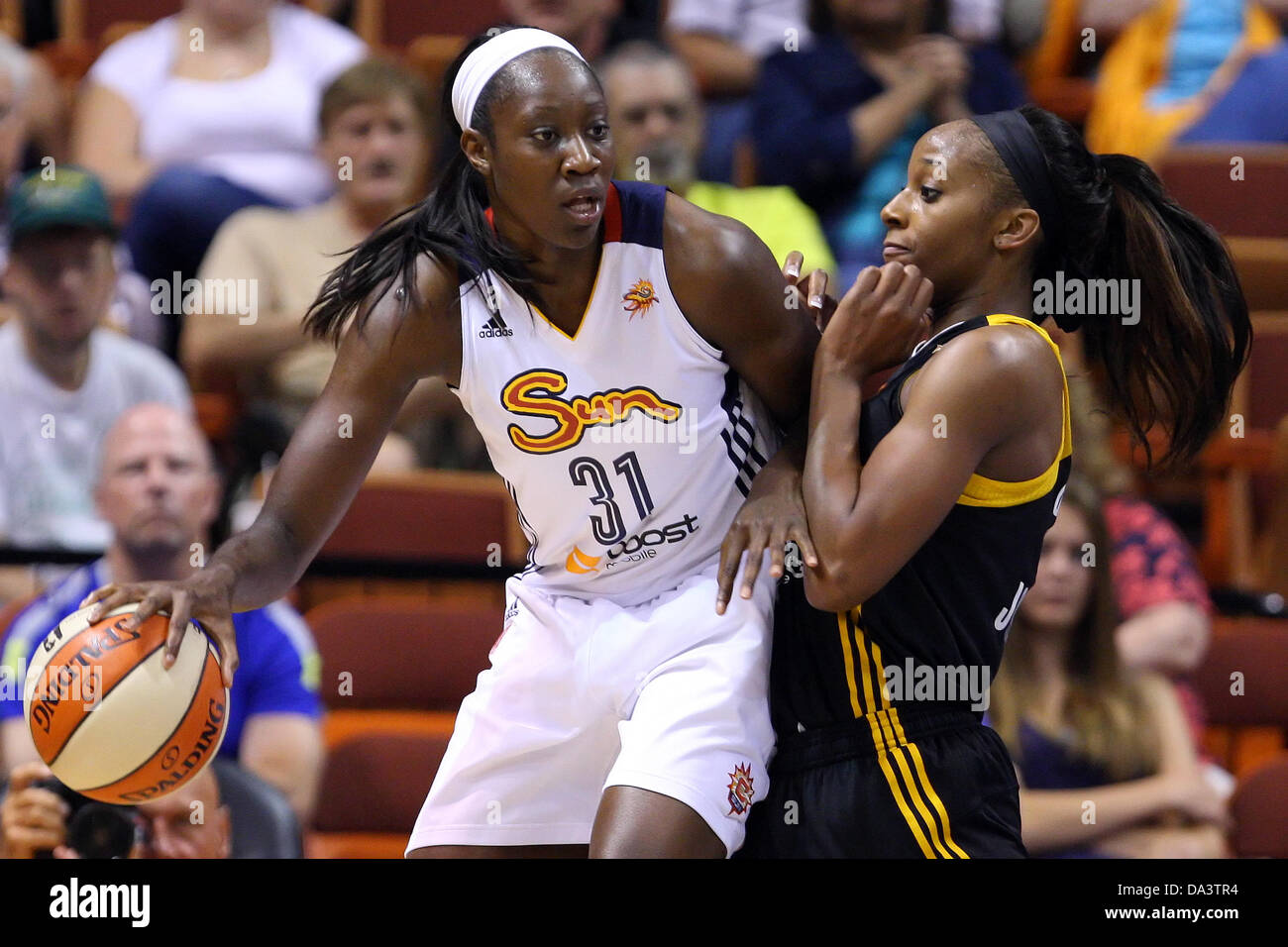 July 2, 2013 - Uncasville, Connecticut, United States - Connecticut Sun center Tina Charles (31) backs down Tulsa Shock forward Glory Johnson (25) on the post during the WNBA basketball game between the Connecticut Sun and Tulsa Shock at Mohegan Sun Arena. Connecticut defeated Tulsa 88-69. Anthony Nesmith/CSM Stock Photo