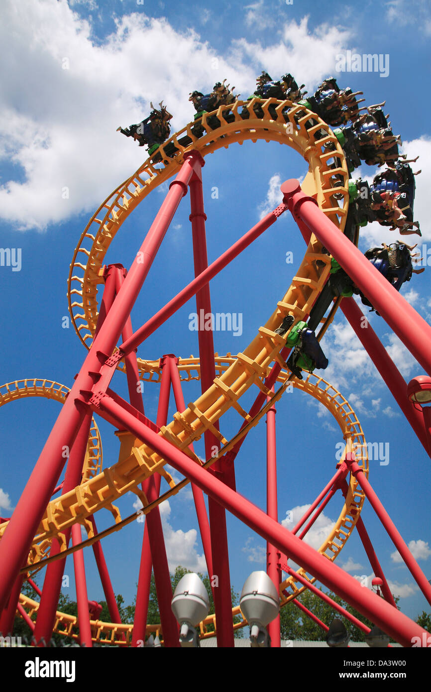 Scary Upside Down Fun With A Colorful Looping Roller Coaster On A Beautiful Sunny Day At The Amusement Park Stock Photo