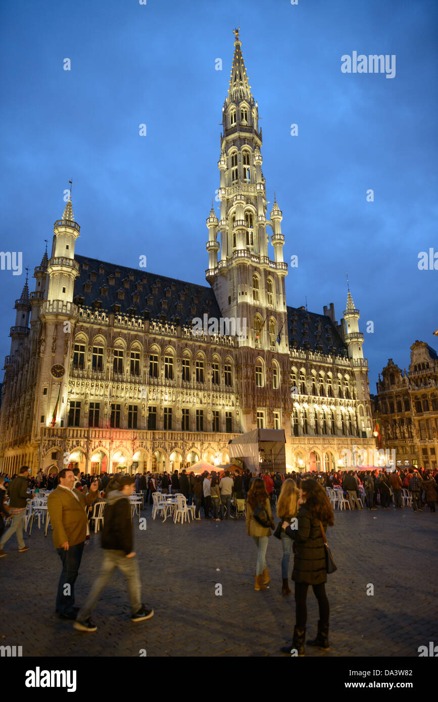 BRUSSELS, Belgium - The Grand Place, Brussels, at night. Originally the city's central market place, the Grand-Place is now a UNESCO World Heritage site. Ornate buildings line the square, including guildhalls, the Brussels Town Hall, and the Breadhouse, and seven cobbelstone streets feed into it. Stock Photo