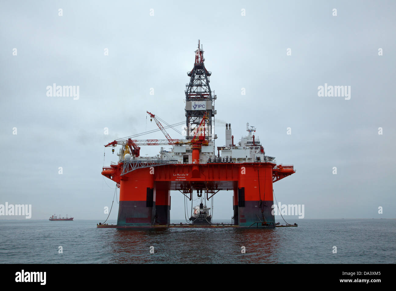 Oil Rig and tender ship, Walvis Bay, Namibia, Africa Stock Photo