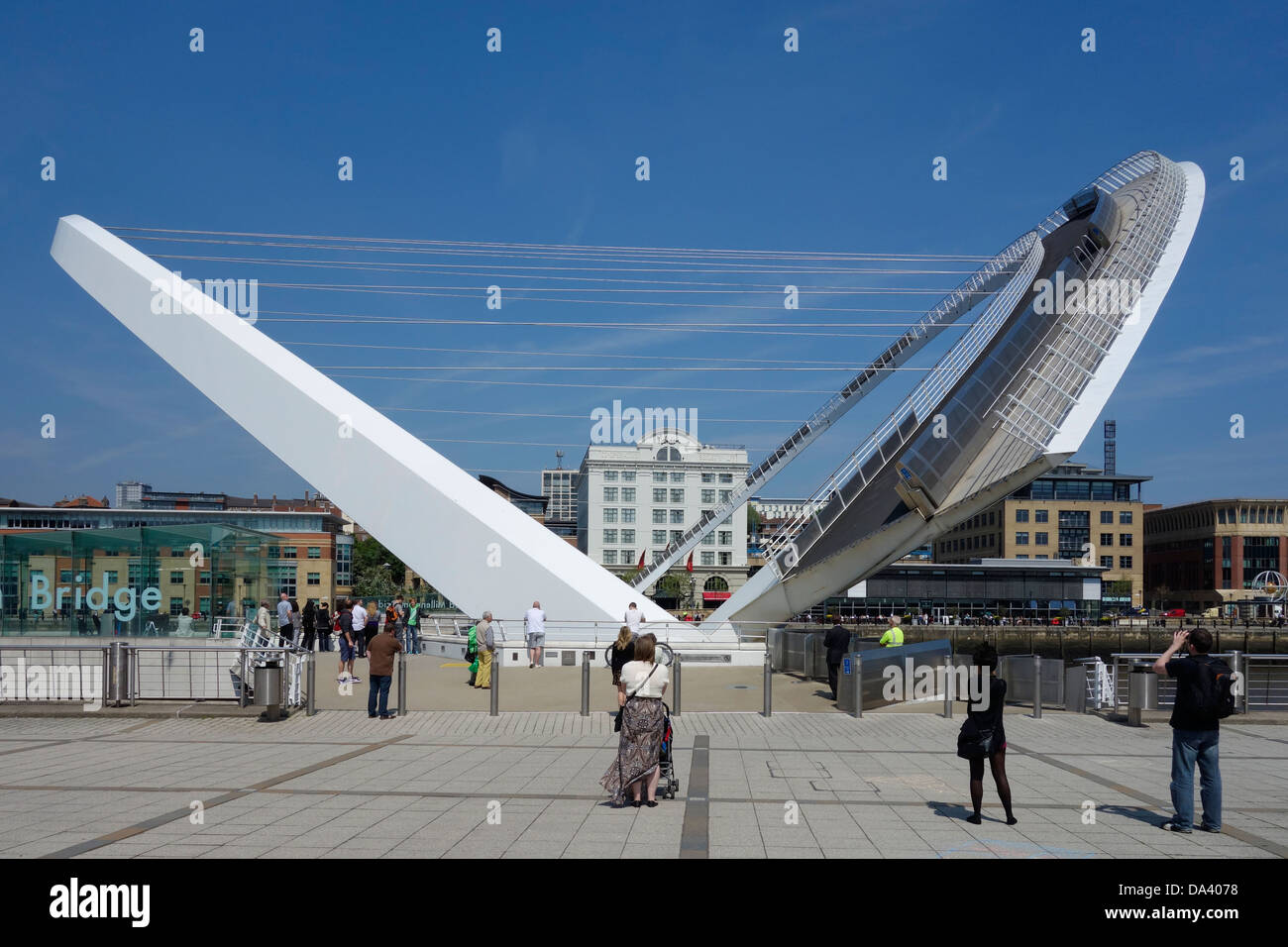Gateshead Millennium Bridge tilting to allow boat to pass. Gateshead, Newcastle upon Tyne, England, UK Stock Photo