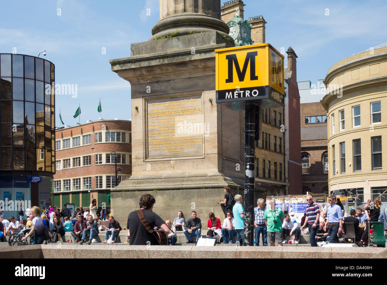 Grey's monument and Monument Metro station sign, Newcastle upon Tyne