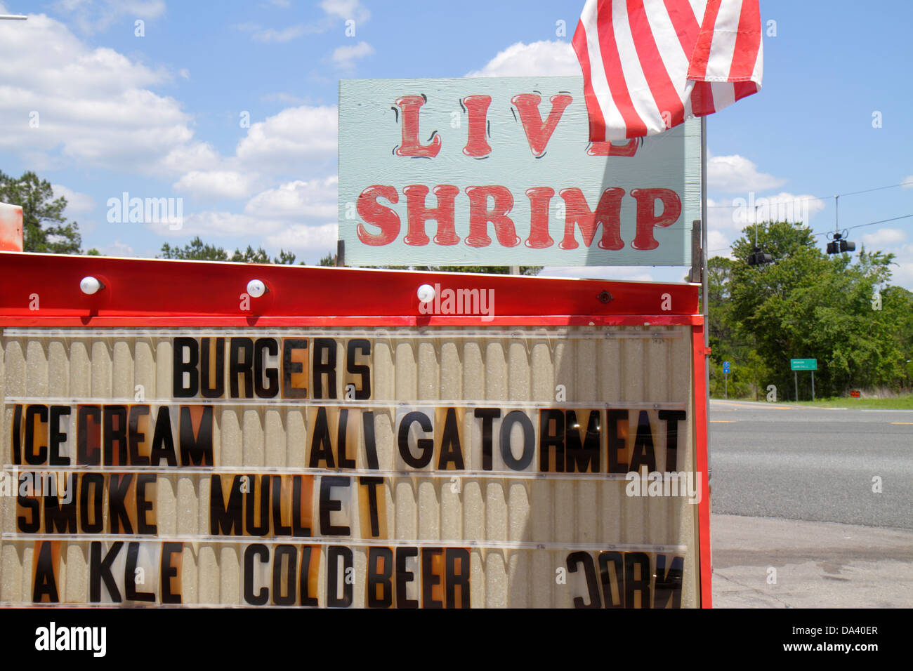 Florida Otter Creek water,Highway highway Route 98,country general store,sign,logo,live shrimp,alligator meat,visitors travel traveling tour tourist t Stock Photo