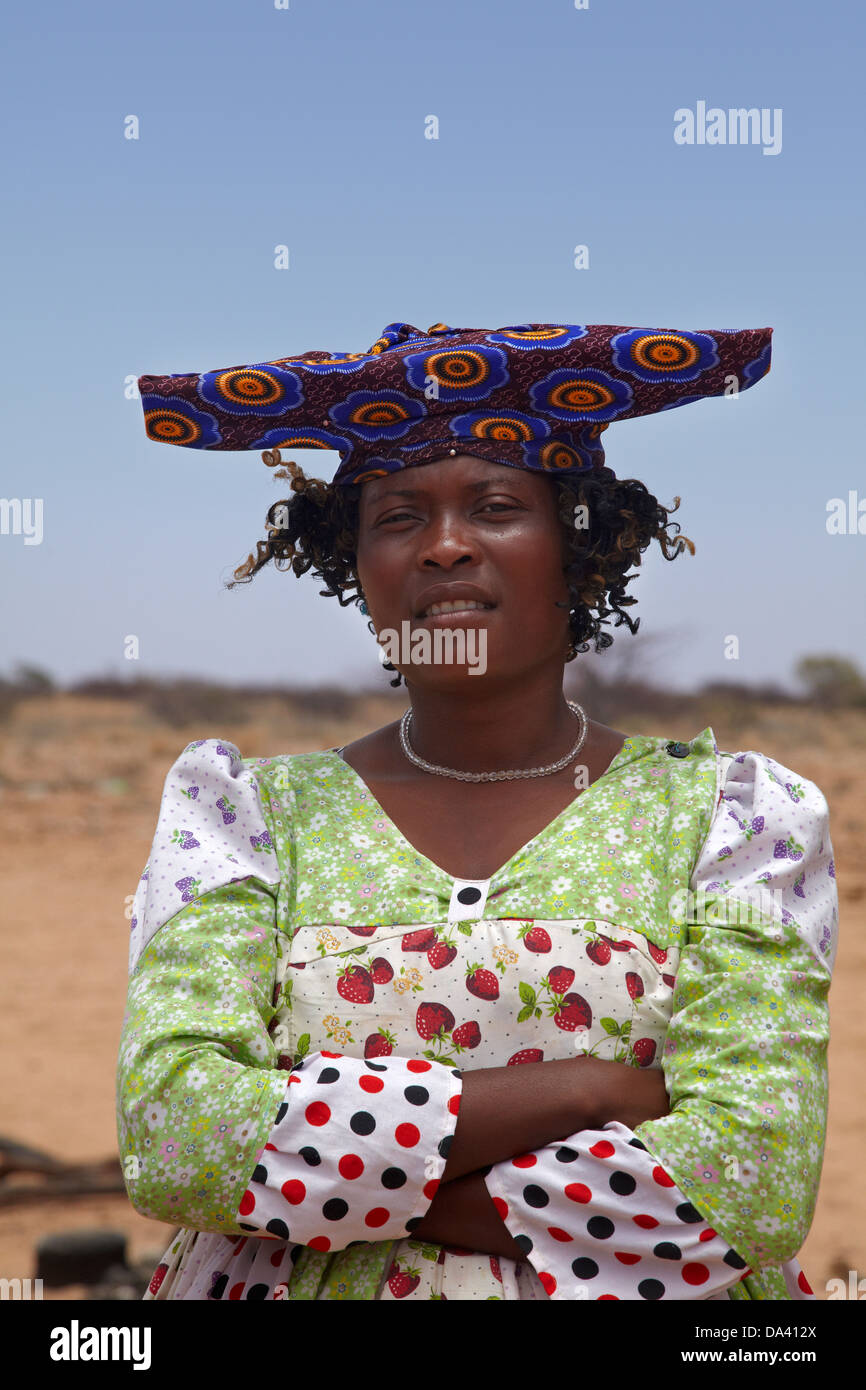 Herero woman in traditional dress, near Uis, Namibia, Africa Stock Photo