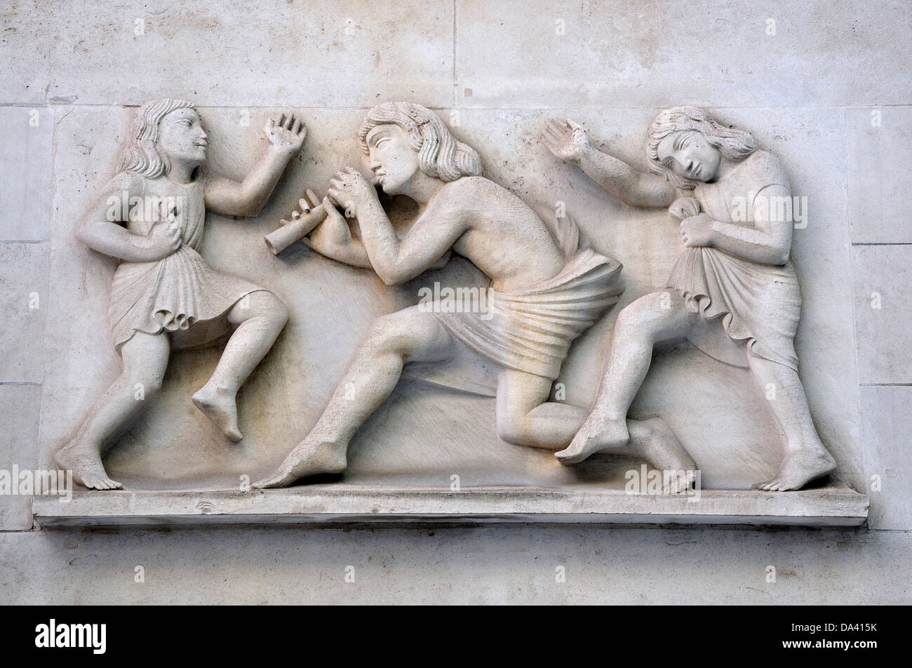 London, England, UK. Broadcasting House (home of the BBC) “Ariel piping to children” by Eric Gill Stock Photo