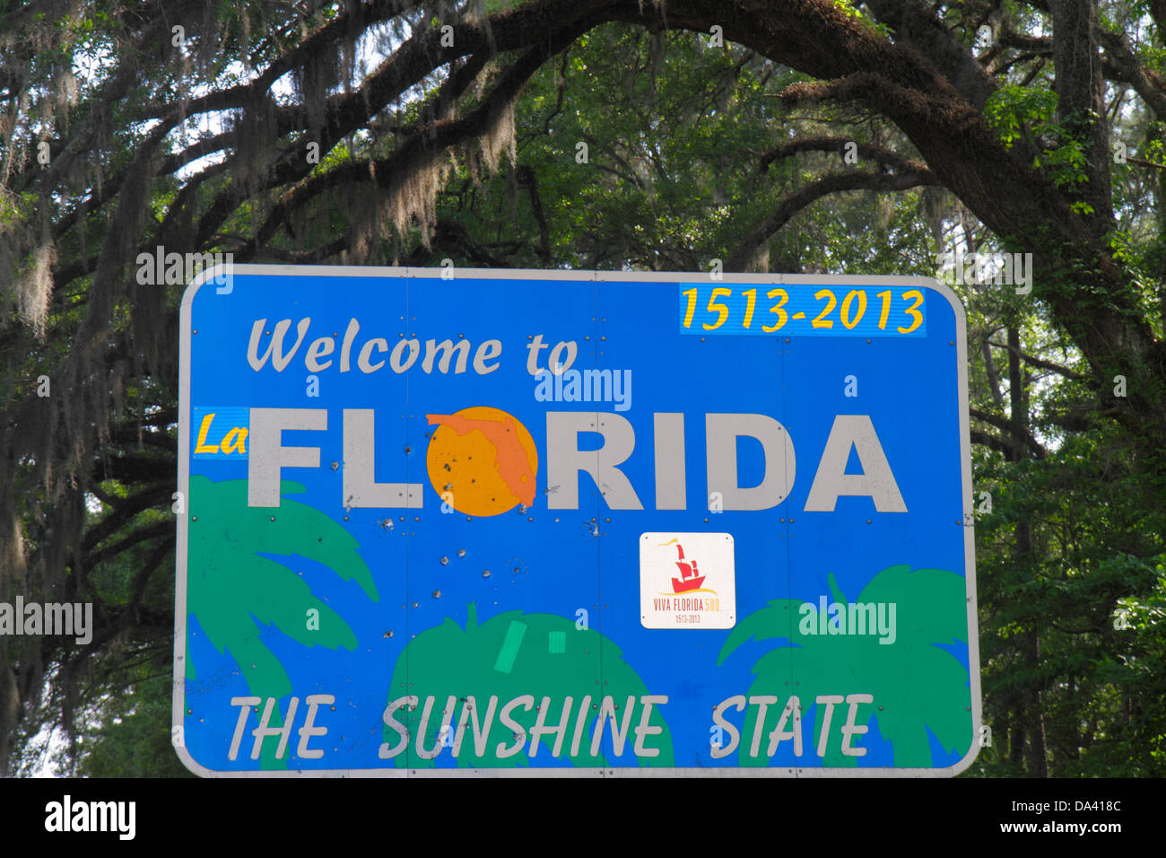 Tallahassee Florida,sign,logo,Welcome to LaFlorida The Sunshine State,trees,canopy,Spanish moss,visitors travel traveling tour tourist tourism landmar Stock Photo