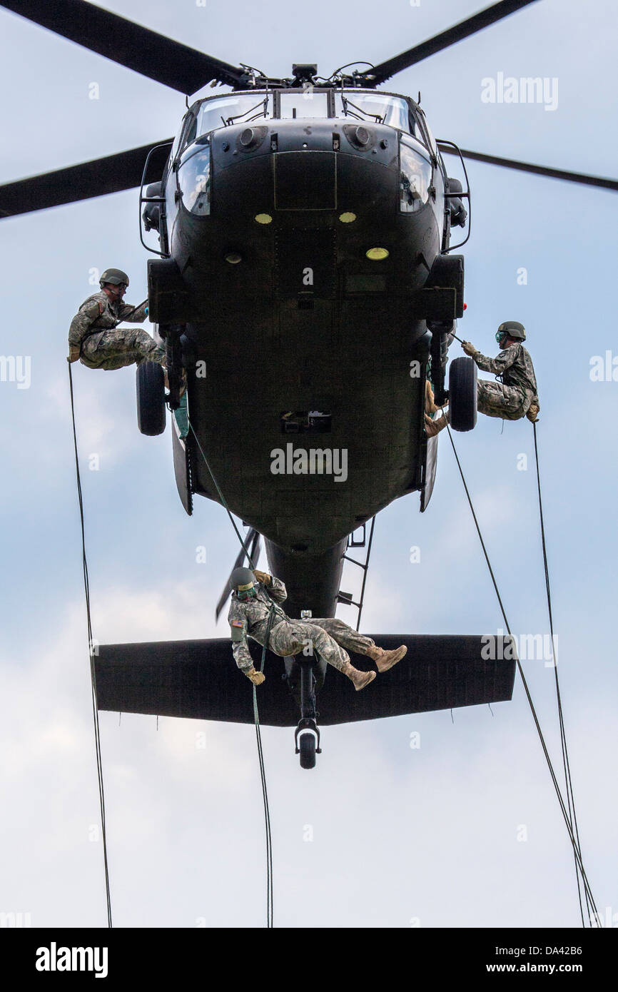 National Guard NJNG UH-60 Black Hawk Black Hawk rappelling Soldier Soldiers Stock Photo
