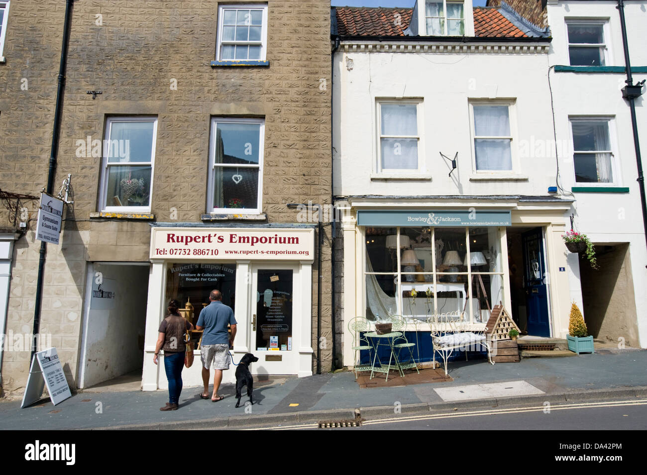 Traditional local shops on Market Street Malton North Yorkshire England